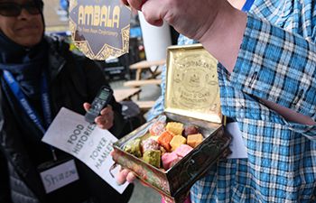 Old biscuit tin filled with sweets