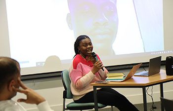 Panellist Ema Effiong speaking to students at the Black in Business event