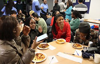 Students enjoying food from Mama Sheila’s Kitchen