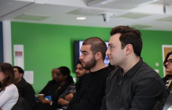 Group of attendees listening to presentation