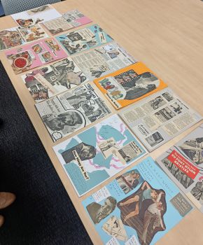 A selection of newspaper collages on a table