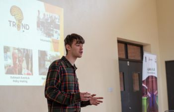 Dexter Shepherd presenting in front of a class