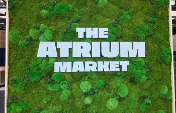 The Atrium Market sign made from petrified moss