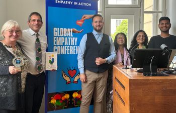 Marcelo Staricoff smiles with others who presented at the 6th Global Empathy Conference in Prague