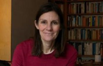 Image of Eleanor Cartwright in front of bookcase