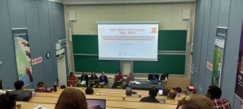 PHD student in lecture theatre