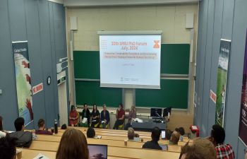 PHD student in lecture theatre