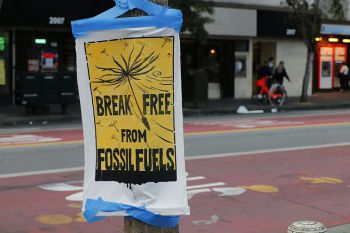 A sign, presented at a protest, that reads: