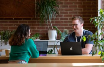 Postgraduate students in the library
