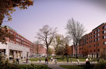Digital image showing a building labelled as supermarket on the left side and red cladded building to the right with trees and grass in the middle.