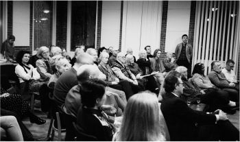 Black and white image of the audience at the Silk Road event