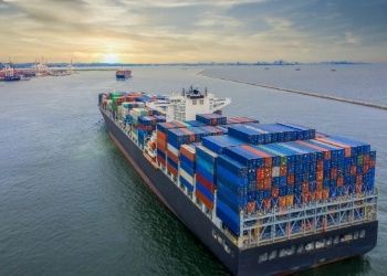 A cargo ship with containers on the sea