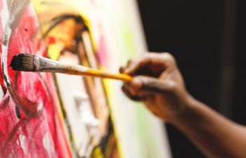 A person painting.