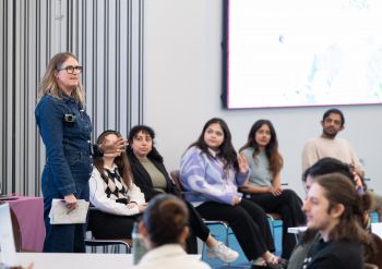 A panel of speakers in their 20s