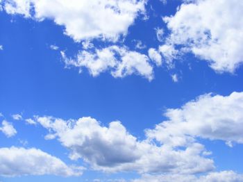 A photo of clouds in a blue sky