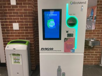 A reverse vending machine (which looks like a big washing machine) in the foyer of Bramber House