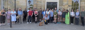 A group photo of staff network members who took part in a campus walk event on 14 May