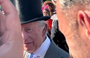 King Charles III in the crowd at the garden party