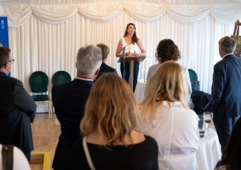 Dr Lucila Newell shares her research at the parliamentary reception at the House of Commons