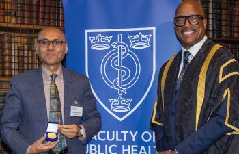 Professor Anjum Memon receiving his award at the annual FPH Awards Ceremony