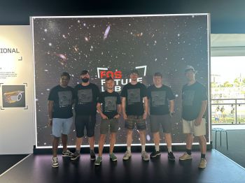 A group picture of University of Sussex researchers at Festival of Speed