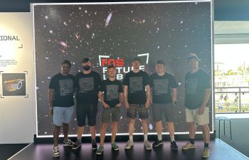 A group picture of University of Sussex researchers at Festival of Speed