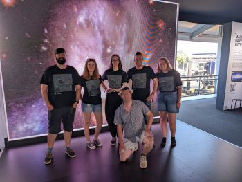 A group picture of University of Sussex researchers at Festival of Speed