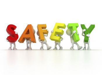 The word safety, with each letter being held up by an animated person.