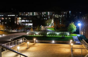 Campus lights at dusk.