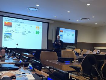 A man making a presentation at an event