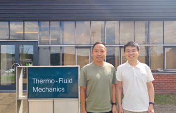 Dr Kun Liang and Dr Hejun Hui photographed outside the TFMRC building
