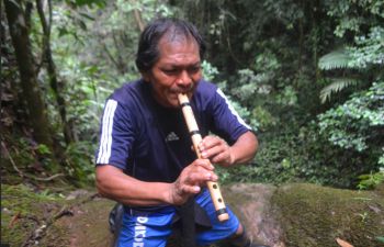 A Wampi playing an instrument