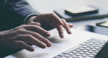 Typing on a laptop keyboard