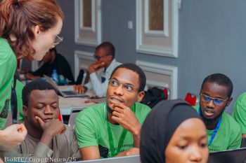 Students listening at the Inaugural Computational Neuroscience summer course
