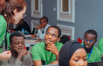 Students listening at the Inaugural Computational Neuroscience summer course