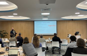 A man makes a presentation in a room