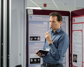 Dr Nick Dowell from BSMS looking at posters at the BIC-ISMRM conference