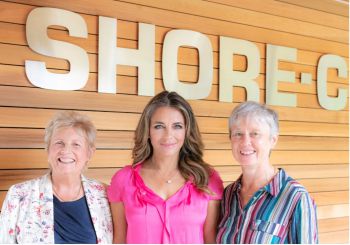 Dame Lesley Fallowfield and Prof Val Jenkins from SHORE-C with actress Elizabeth Hurley