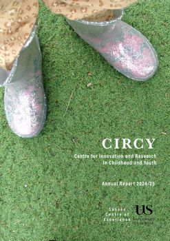 Image of CIRCY Annual Report cover - shows a toddler's legs and little shoes stood on bright green astroturf.