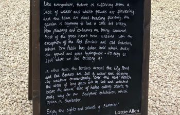 Chalkboard at entrance to garden with message from Head Gardener at Hidcote Manor
