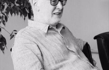 a black and white photo of Prof Jim Rollo