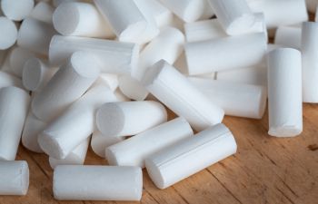 A close up of cigarette filters on a table
