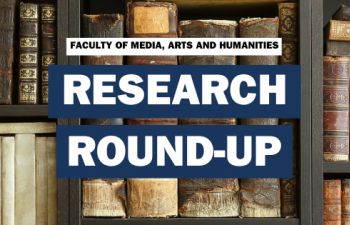 Bookshelves with antique books in the background with Research Round-up written on the top