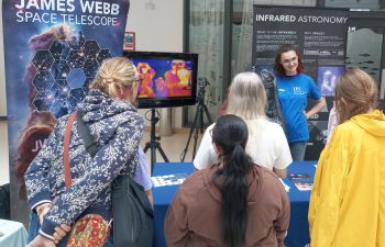 University of Sussex exhibitor stand at Hastings Science Fair, showing interactive STEM activities and displays