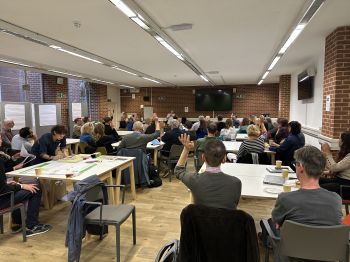 A group of people attending the first Affiliates Forum