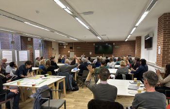 A group of people attending the first Affiliates Forum