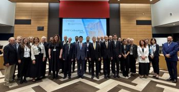 Prof Shute is shown in the centre of a large group of people who are the organisers and speakers of this international colloquium