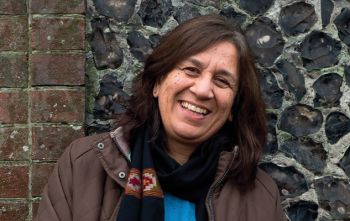 Professor Maya Unnithan smiling at the camera