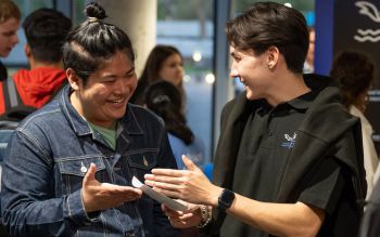 Students looking very happy and chatting