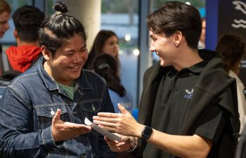Students looking very happy and chatting
